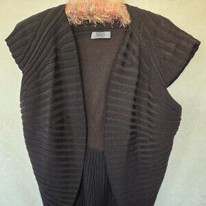 Black size 10 Italian wool sweater vest by "She's So"